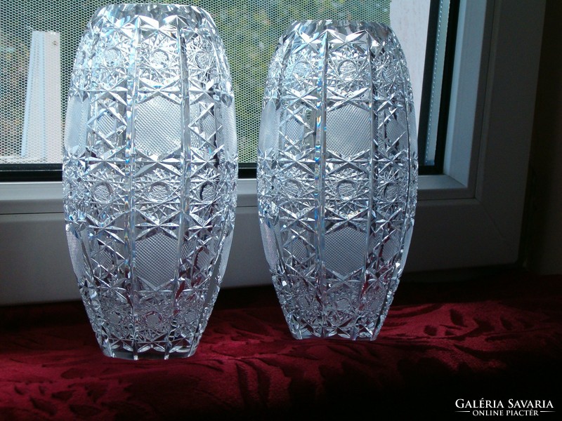A pair of specially shaped lead crystal vases
