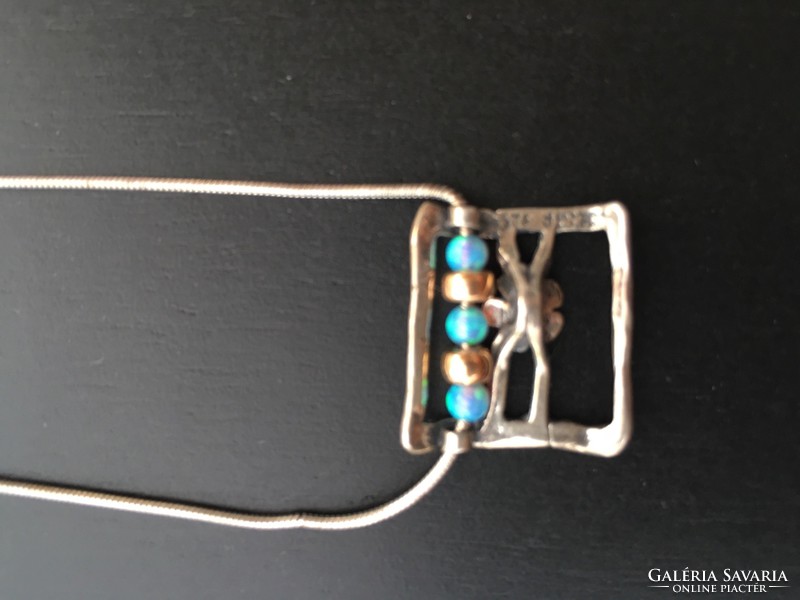 Israeli silver necklace with blue fire opal