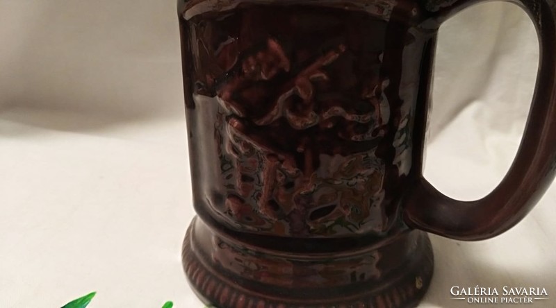 Folk ceramics, including a Corundian vase, in mixed quality (the lid of the cup falls off)