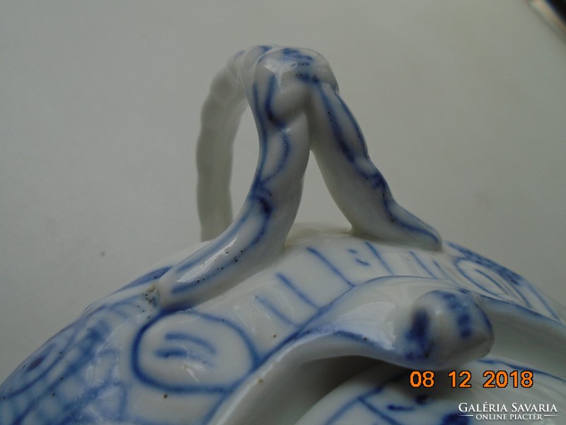 Embossed with rococo patterns, museum, with a version of the blue onion from Meissen, tea pourer
