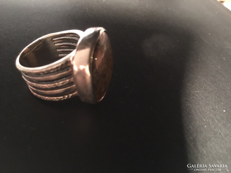 Silver ring with bronze stone, which is an extra striking piece (silpada)