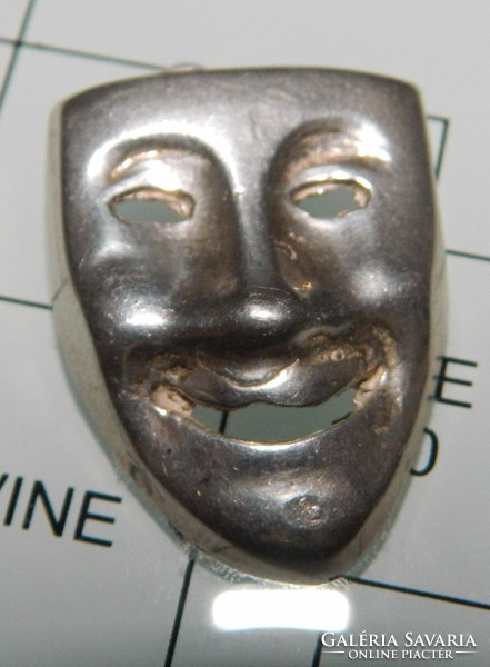 Silver mask pendant
