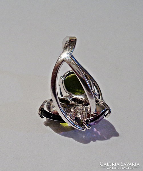 Two green and one purple stony silver rings
