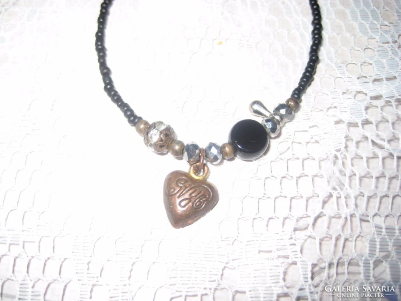 Old bracelet with a heart