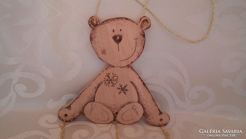 Christmas teddy bear on wooden door decoration