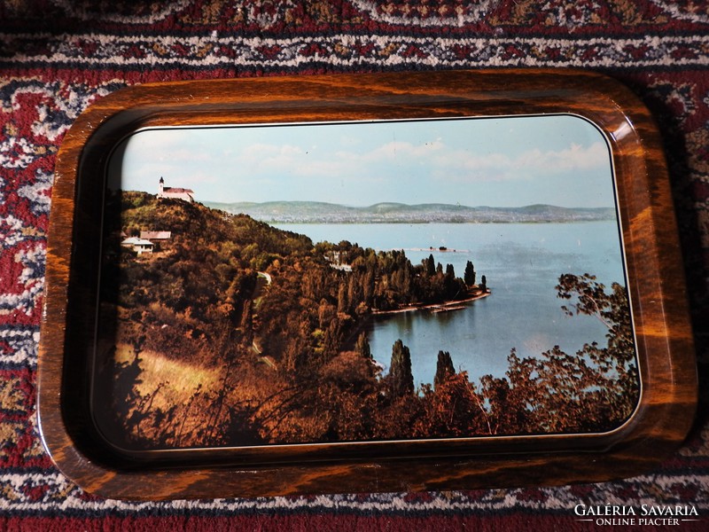 Old enamel bowl with waterfront landscape
