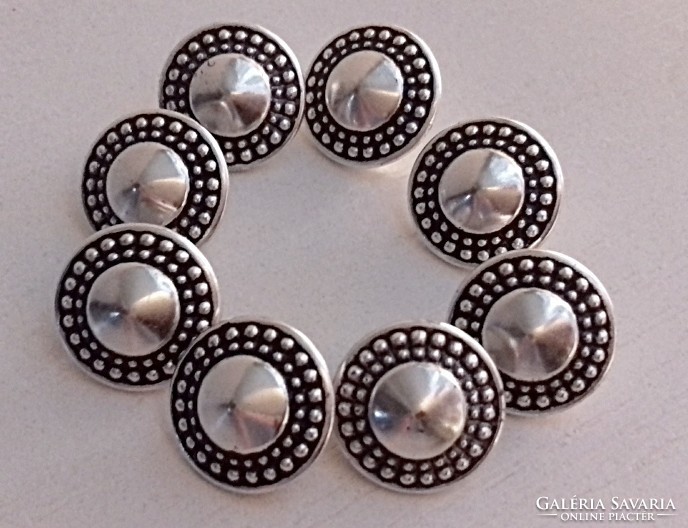 8 beautiful marked silver-plated decorative buttons.