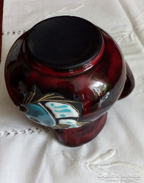 Ceramic jug with a fish pattern