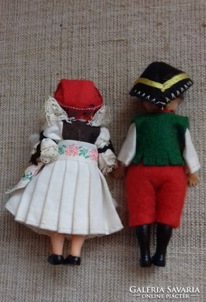 2 retro rubber dolls in folk costume in one