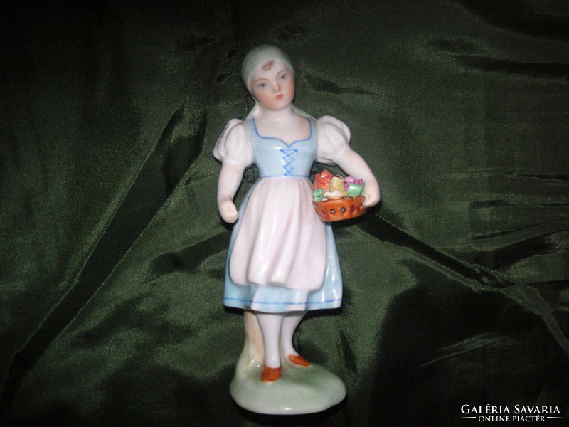 An old beautiful lady from Herend, from the 50s, little girl with roses