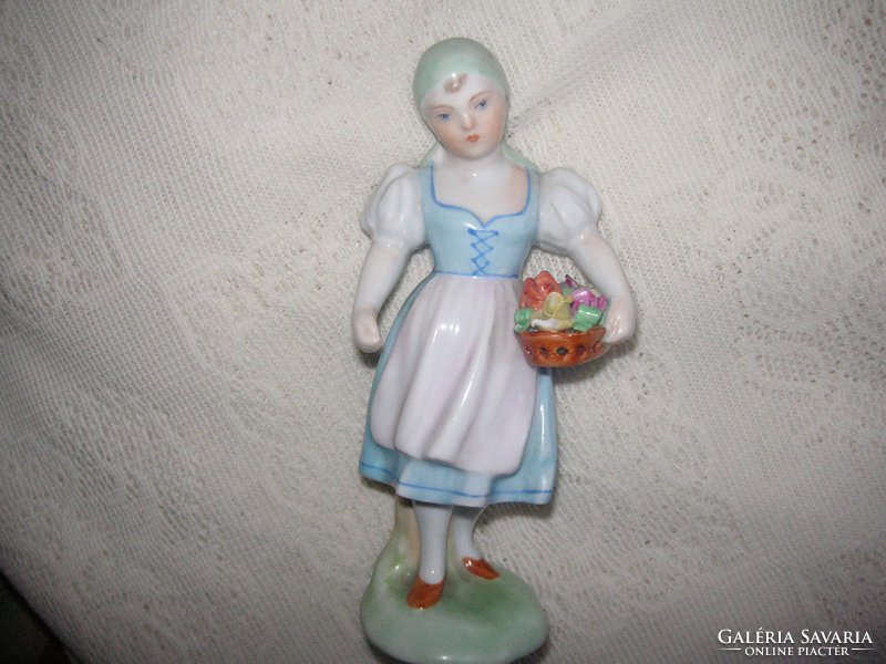 An old beautiful lady from Herend, from the 50s, little girl with roses