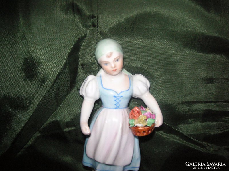 An old beautiful lady from Herend, from the 50s, little girl with roses
