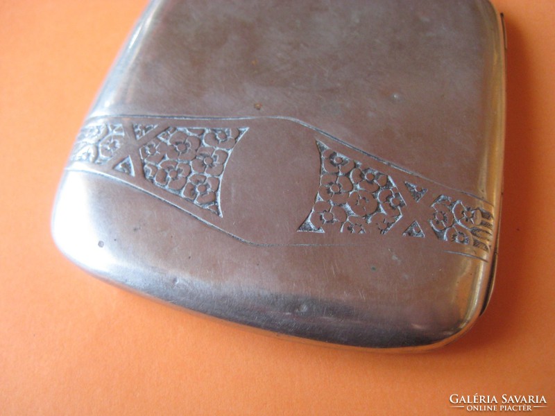 Silver-plated cigarette holder from the 1910s with an Art Nouveau pattern