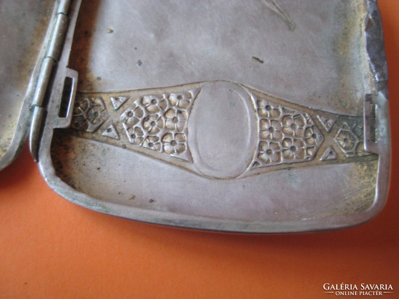 Silver-plated cigarette holder from the 1910s with an Art Nouveau pattern