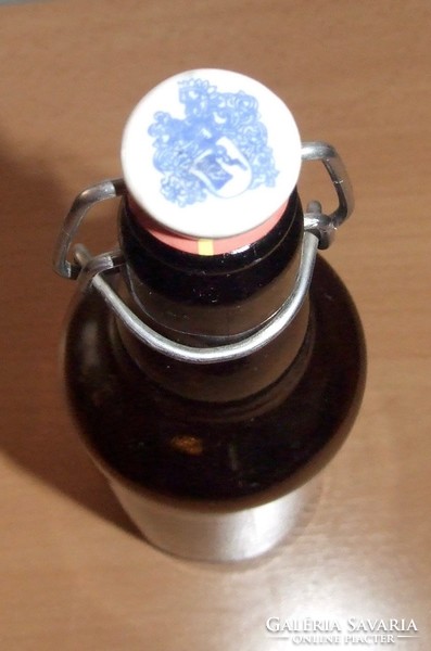 Old buckled beer bottle