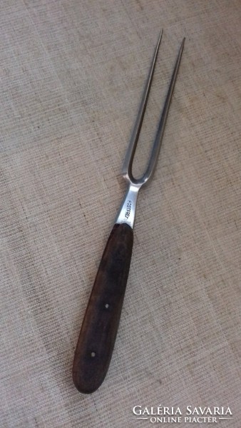 Old meat needle with a wooden handle