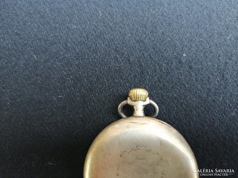 Omega pocket watch shown in the pictures for sale - it works