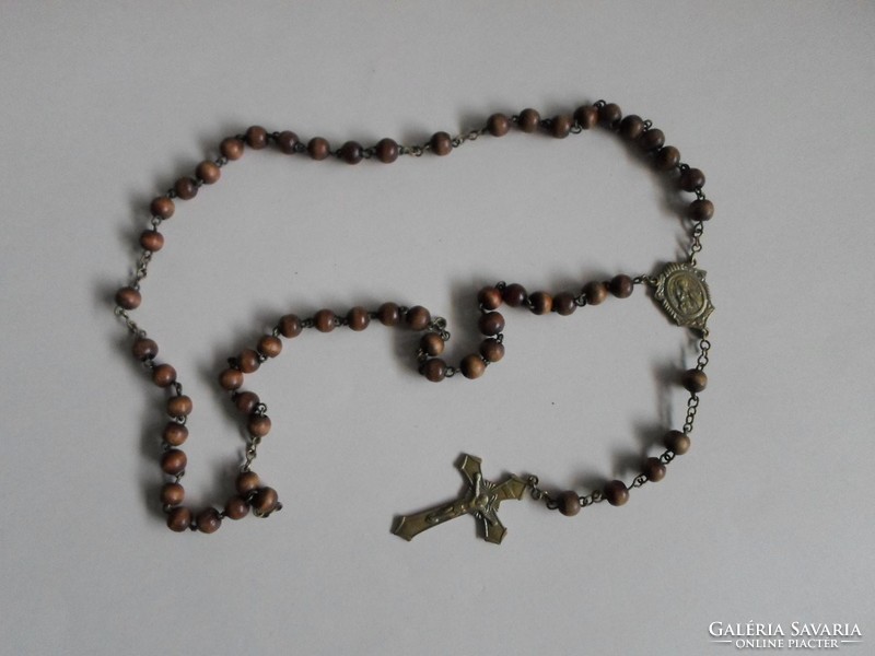 Old, copper and wooden rosary