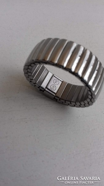 Beautiful condition brand marked stainless steel spring ring adorned with tiny polished stone