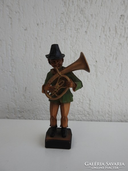 Musician playing horn - musician figure