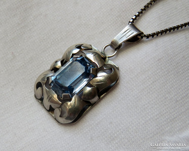 Beautiful old handmade silver pendant with an aquamarine stone on a silver chain