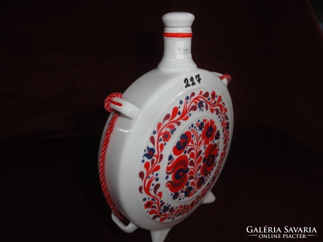 Raven house porcelain, water bottle with blue / red motif, diameter 14.5 cm. He has!