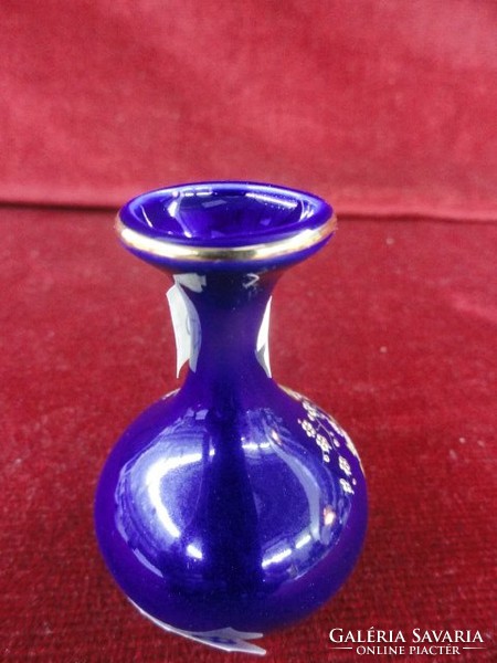 Japanese porcelain, mini vase. Hand painted. He has!