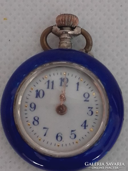 Argent dore, swiss silver pendant watch. With gold decoration on the back.