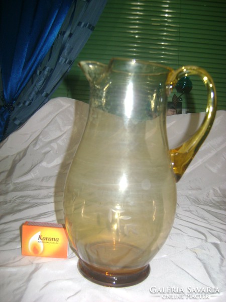 Old amber engraved glass pitcher