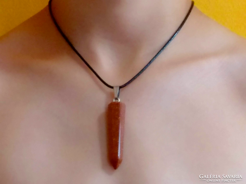 Golden sandstone reiki chakra pendant, hexagonal bar, on waxed leather thread