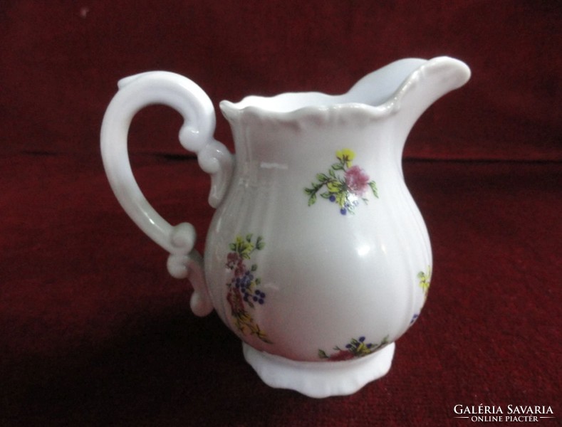 Zsoslnay porcelain, milk pourer. Beautiful shape with solid colorful flower pattern. He has!