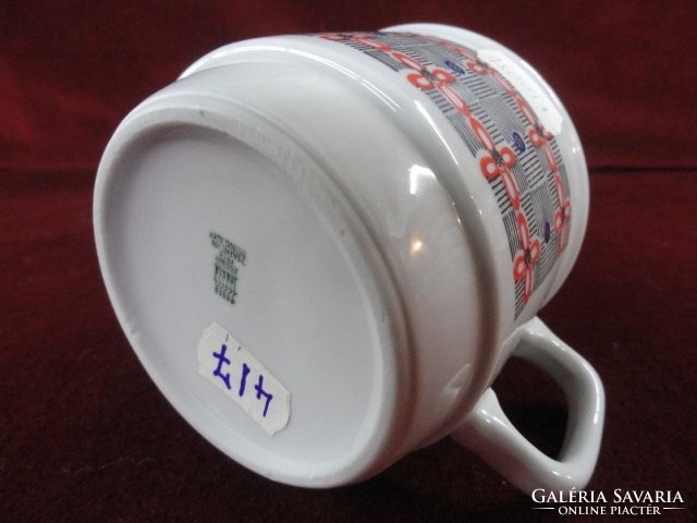 Zsolnay porcelain patterned mug on a snow-white background. Its diameter is 9 cm. He has!