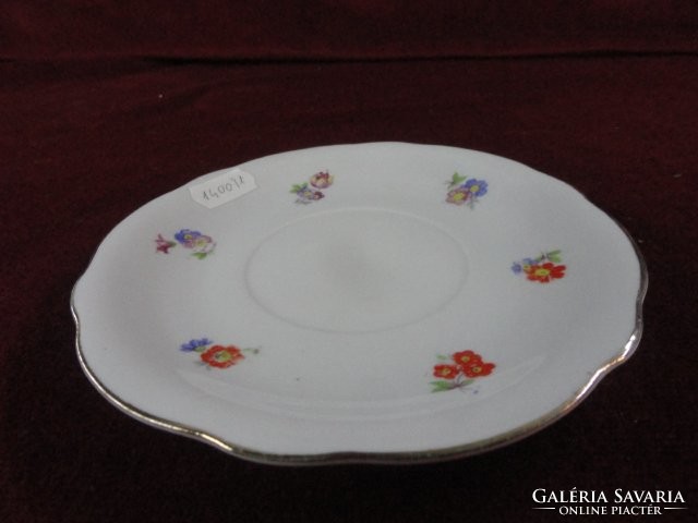 Zsolnay porcelain teacup coaster with small floral pattern. He has!