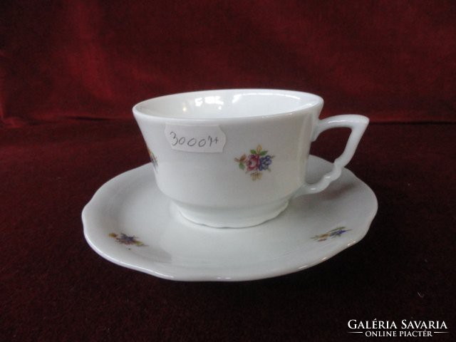Zsolnay porcelain teacup + placemat. Leprechaun with a small flower pattern. Antique. He has!