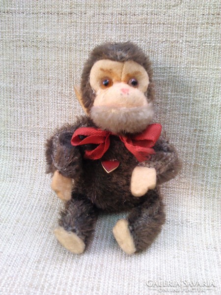 Antique heart marked small monkey