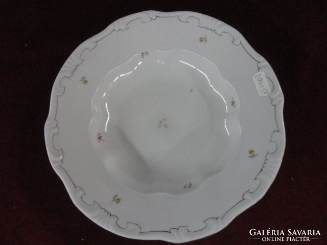 Zsolnay porcelain deep plate. Tiny floral pattern with a silver border. Antique, shield pattern. He has!
