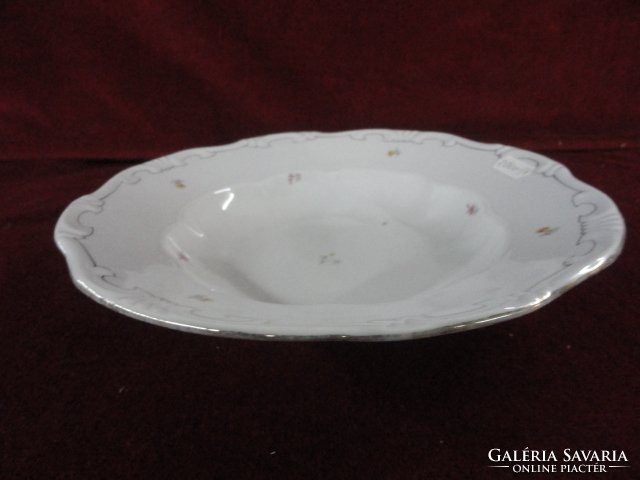 Zsolnay porcelain deep plate. Tiny floral pattern with a silver border. Antique, shield pattern. He has!