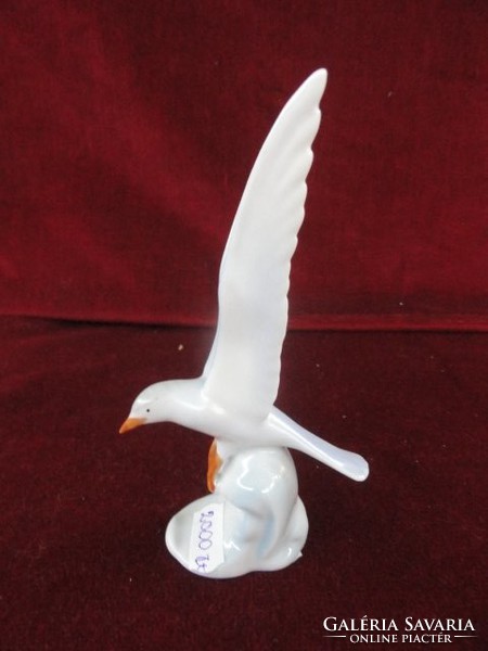 Raven house porcelain figural sculpture with hand painted flying seagull. He has!