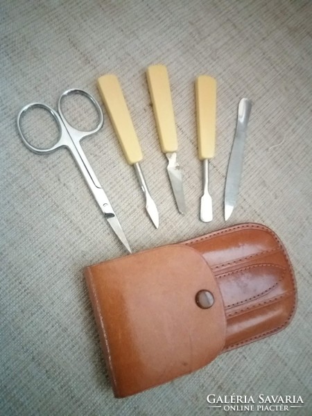 Retro old travel manicure set in a leather case