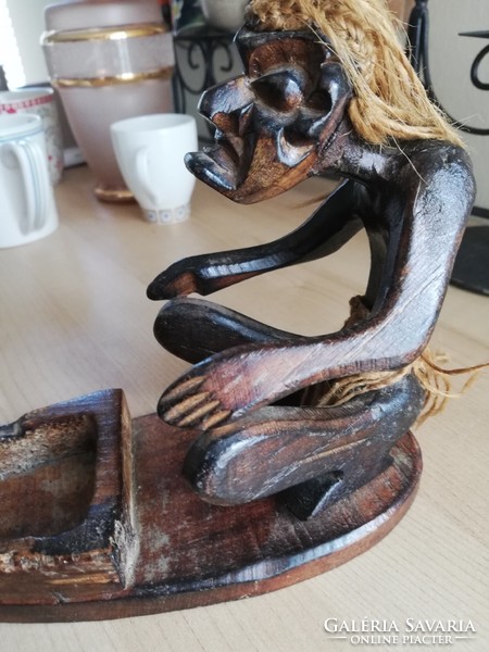 Old ugly wooden statue