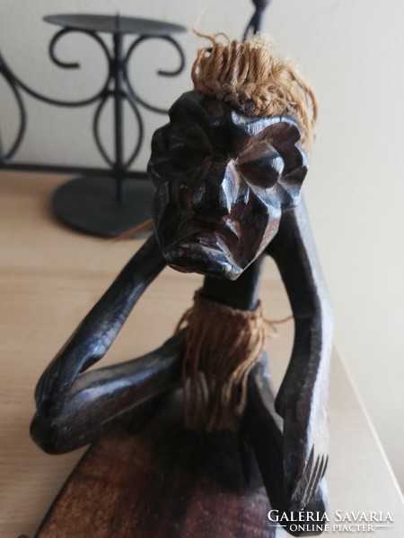 Old ugly wooden statue