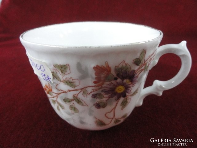 German porcelain teacup, floral, embossed. He has!