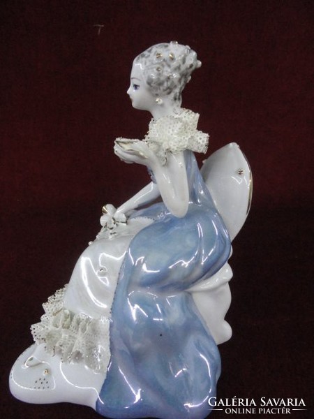 Porcelain figurative statue of Stipo Dorohoi. The princess is in a light blue lacy dress. He has!