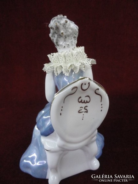 Porcelain figurative statue of Stipo Dorohoi. The princess is in a light blue lacy dress. He has!