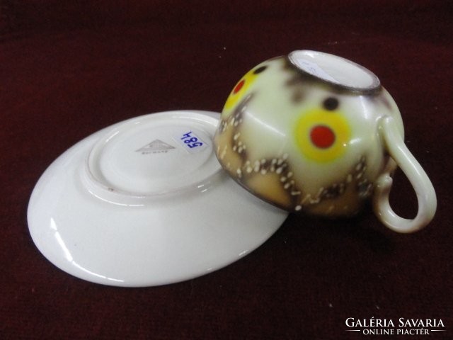 Bihl German porcelain antique tea cup + saucer. On a cream-colored base with a yellow/brown motif. He has!