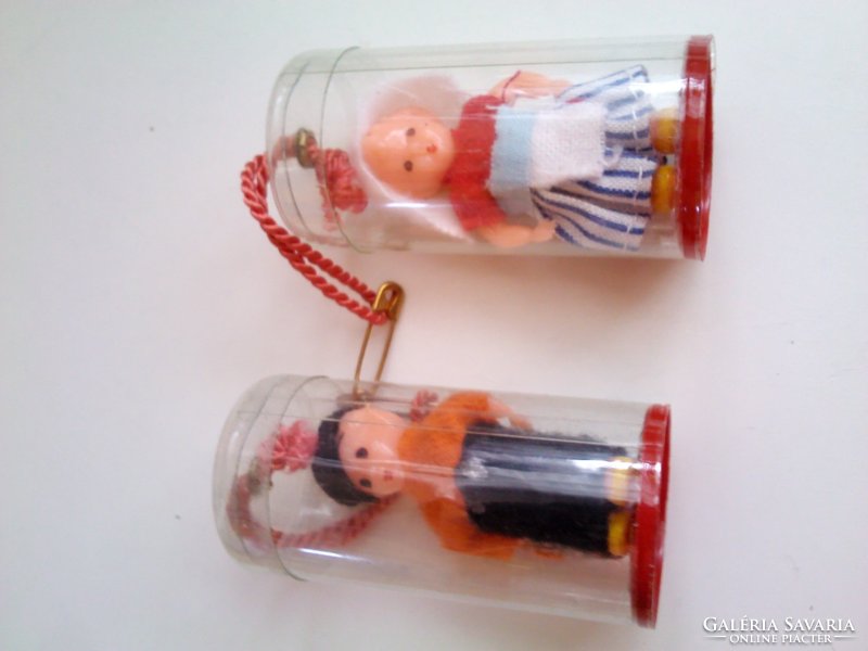 Old souvenir dolls in a box