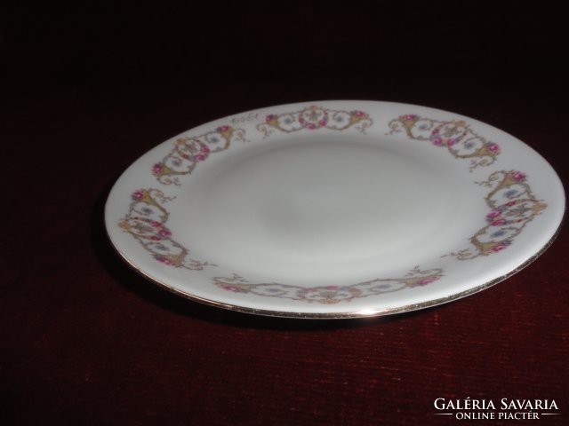 Mz Czechoslovak porcelain antique cake plate. On a snow-white background with a gold/pink pattern. He has!