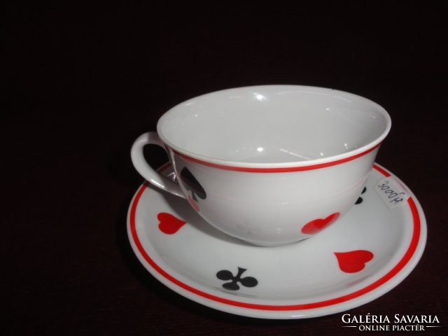 Zsolnay teacup plus placemat with French card motif. He has!