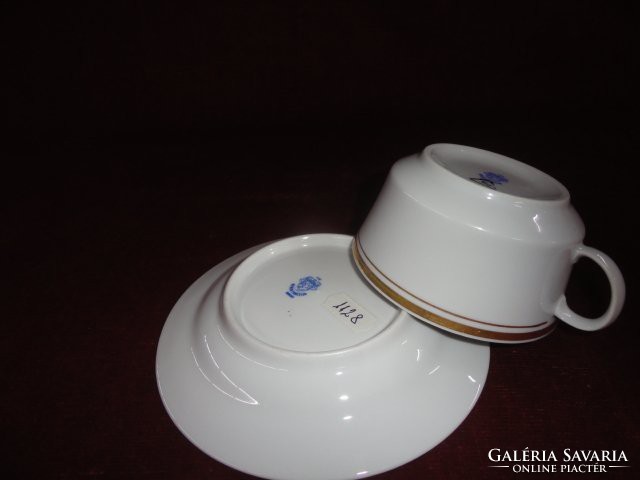 Alföldi porcelain tea cup + saucer. On a white background with a double gold stripe. He has!