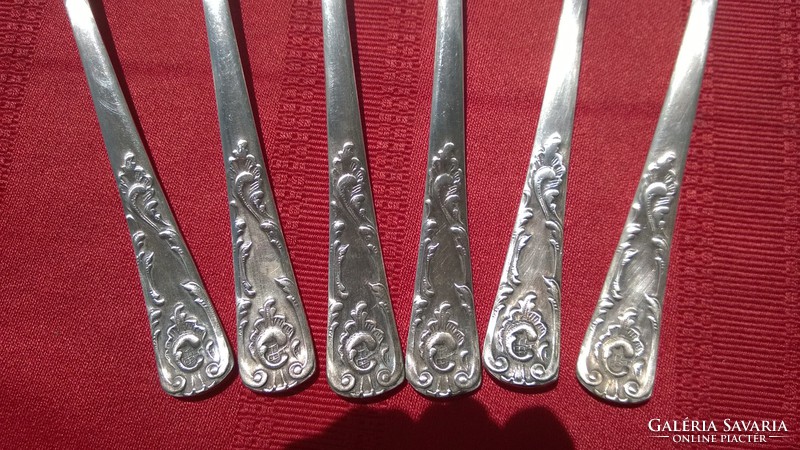 Silver-plated ornate cutlery set for dinner